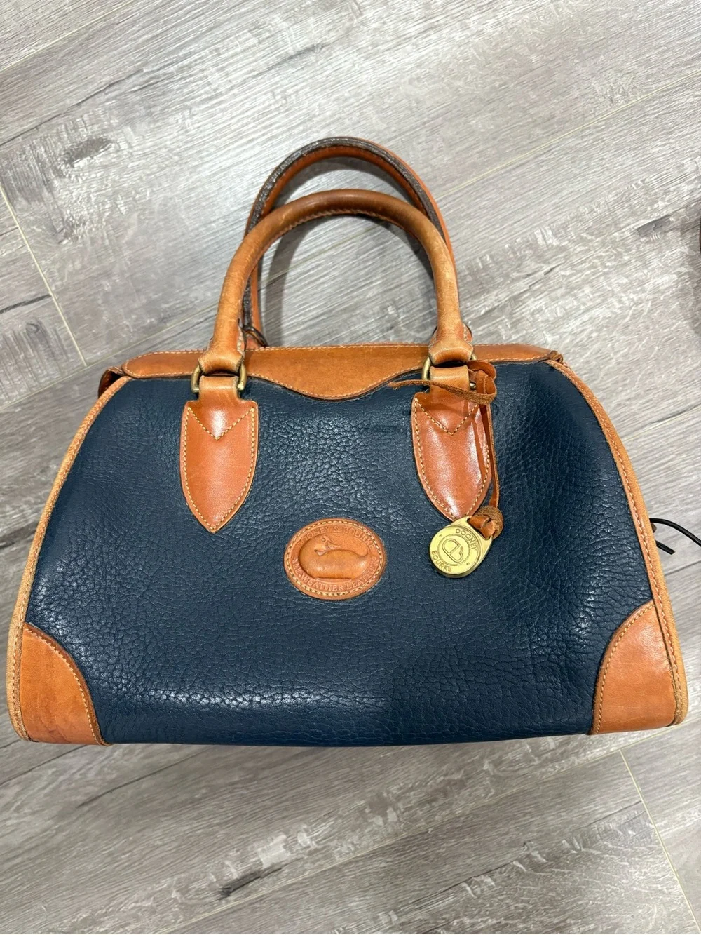 Dooney & Bourke Navy and Tan Pebbled Leather Doctor Bag